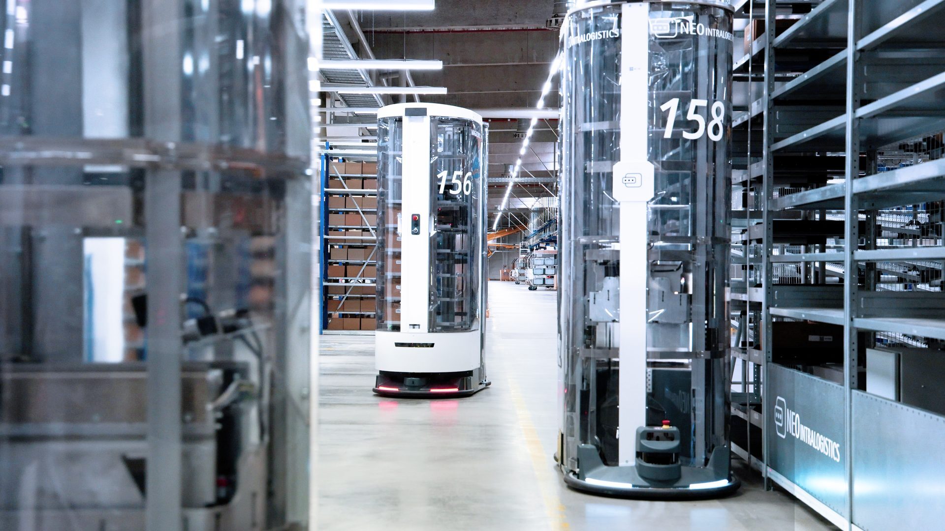 Two TORU robots side by side in operation